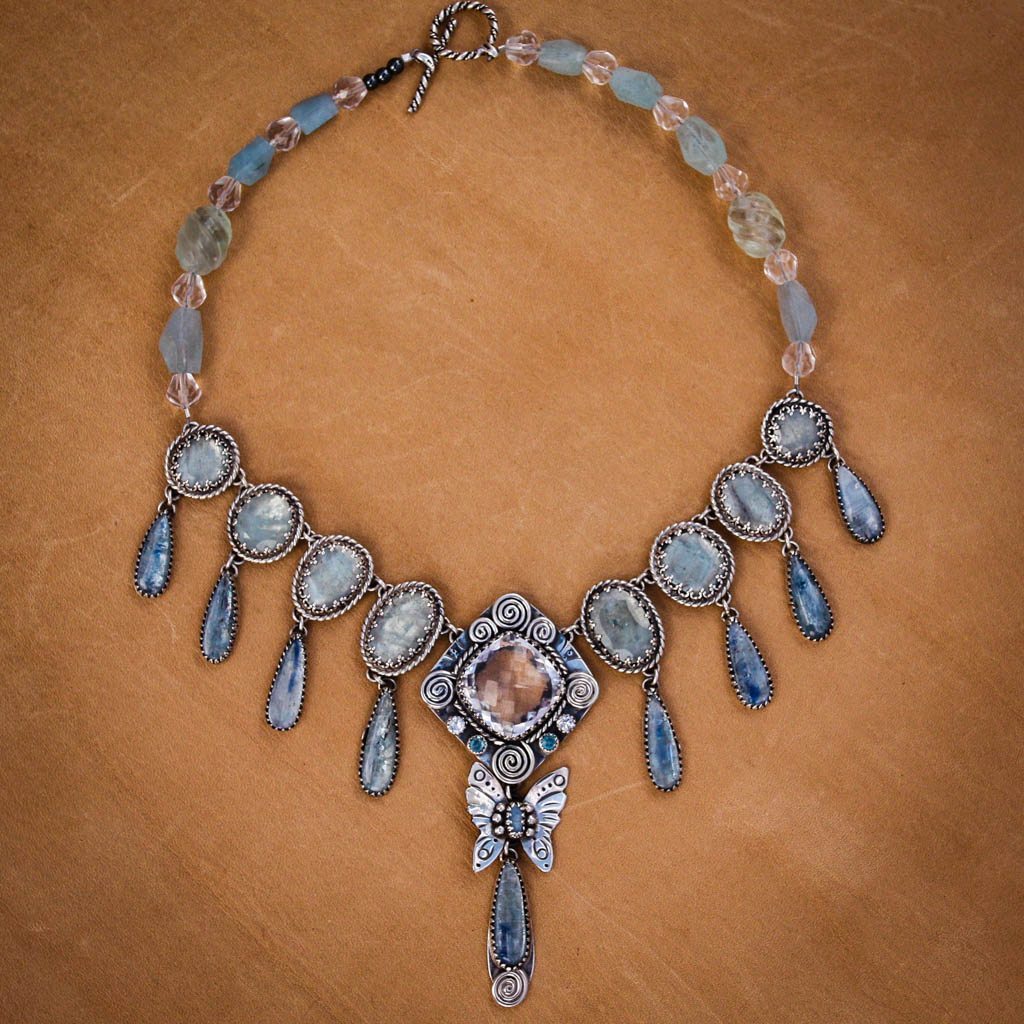 Kyanite rebalances and cleanses in handcrafted jewelry